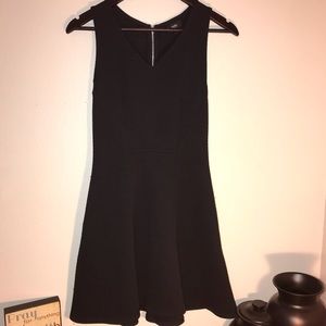 Black dress with silver zipper